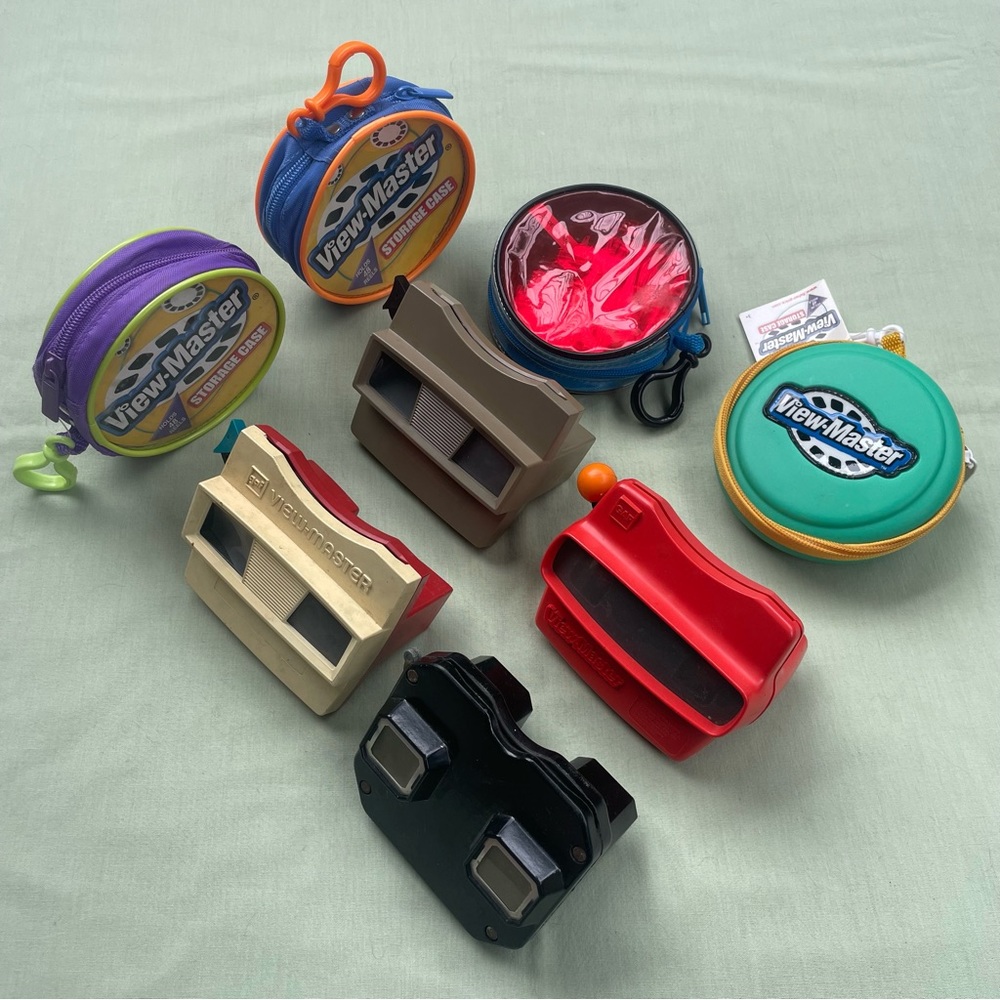 Lot of 4 vintage View-masters with 4 reel storage cases